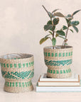 seagrass baskets with green stitching detail