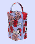 A blue dopp kit with a red and pink floral snoopy print.