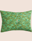 A set of two green floral printed pillowcases.