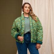 A green floral jacket with a dark green interior.