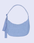 A light blue nylon handbag with an arched crescent shape and adjustable strap.