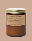 Candle features amber glass with a gold lid. The label is kraft paper with typewriter font that reads "No.21: Golden Coast Soy Candle Handmade in California with 100% Soy Wax. P.F. Candle Co."