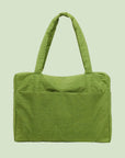 A vibrant green puffer tote bag.