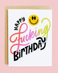 card that reads "happy fucking birthday" with a smiley face