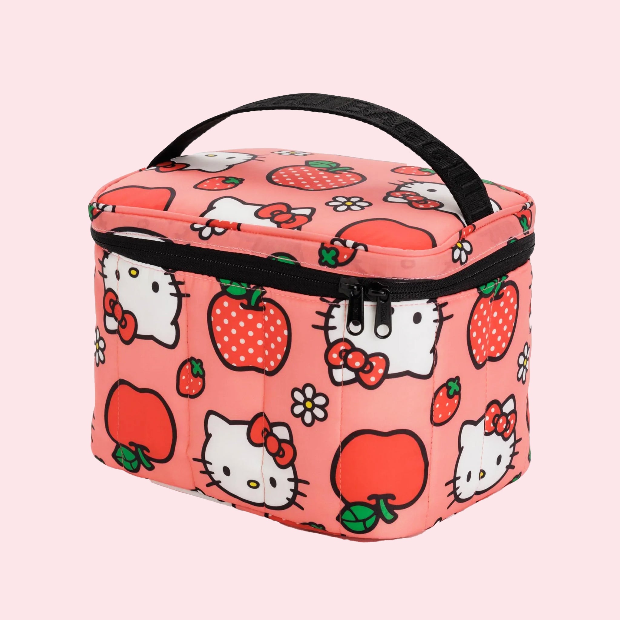 A pink and red Hellot Kitty patterned lunch box with a black handle and zipper. 