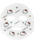 On a white background is a sheet mask with Hello Kitty graphics.