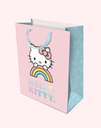 A light pink and blue hello kitty bag with holographic lettering that reads, "Hello Kitty".
