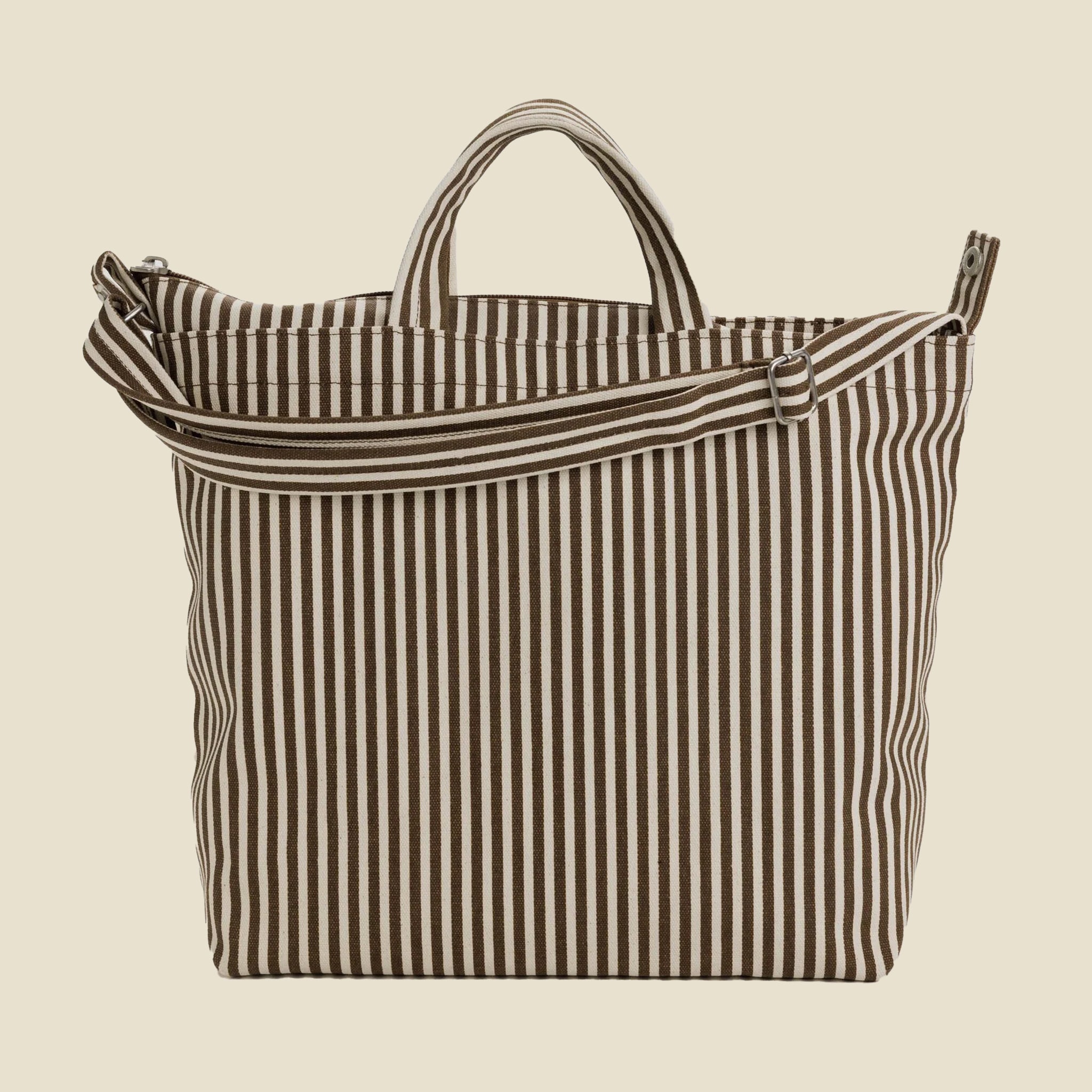 A brown and ivory striped canvas tote bag with two different handle options. 
