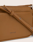 detailed view of brown crossbody bag