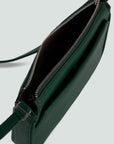 detailed view of a deep green crossbody bag