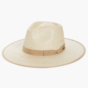 On a white background is a light tan colored straw sun hat with a ribbon edge and border around the base.