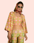 A pink, green and orange 60s-70s print patterned kimono robe.