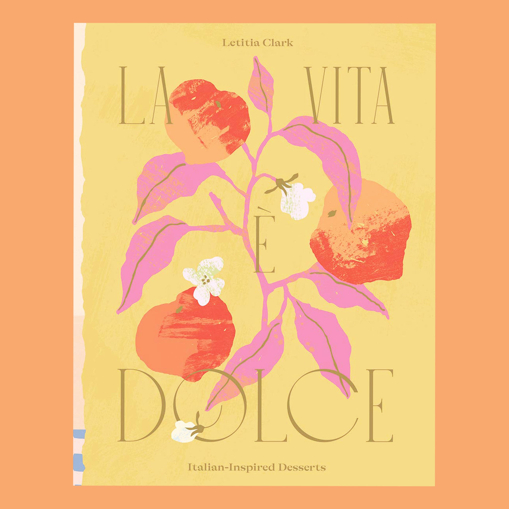 On an orange background is a yellow book cover with a fruit and foliage graphic with the title that reads, &quot;La Vita E Dolce Italian Inspired Desserts&quot;. 