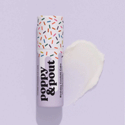 On a lavender background is a purple lip balm with a white and multi color "sprinkle" design with black text that reads, "poopy & pout birthday confetti cake".
