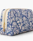 blue cosmetic pouch with white flower pattern