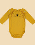 A long sleeve mustard onesie with a lion face in the center.