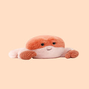 A light orange crab shaped stuffed animal toy.