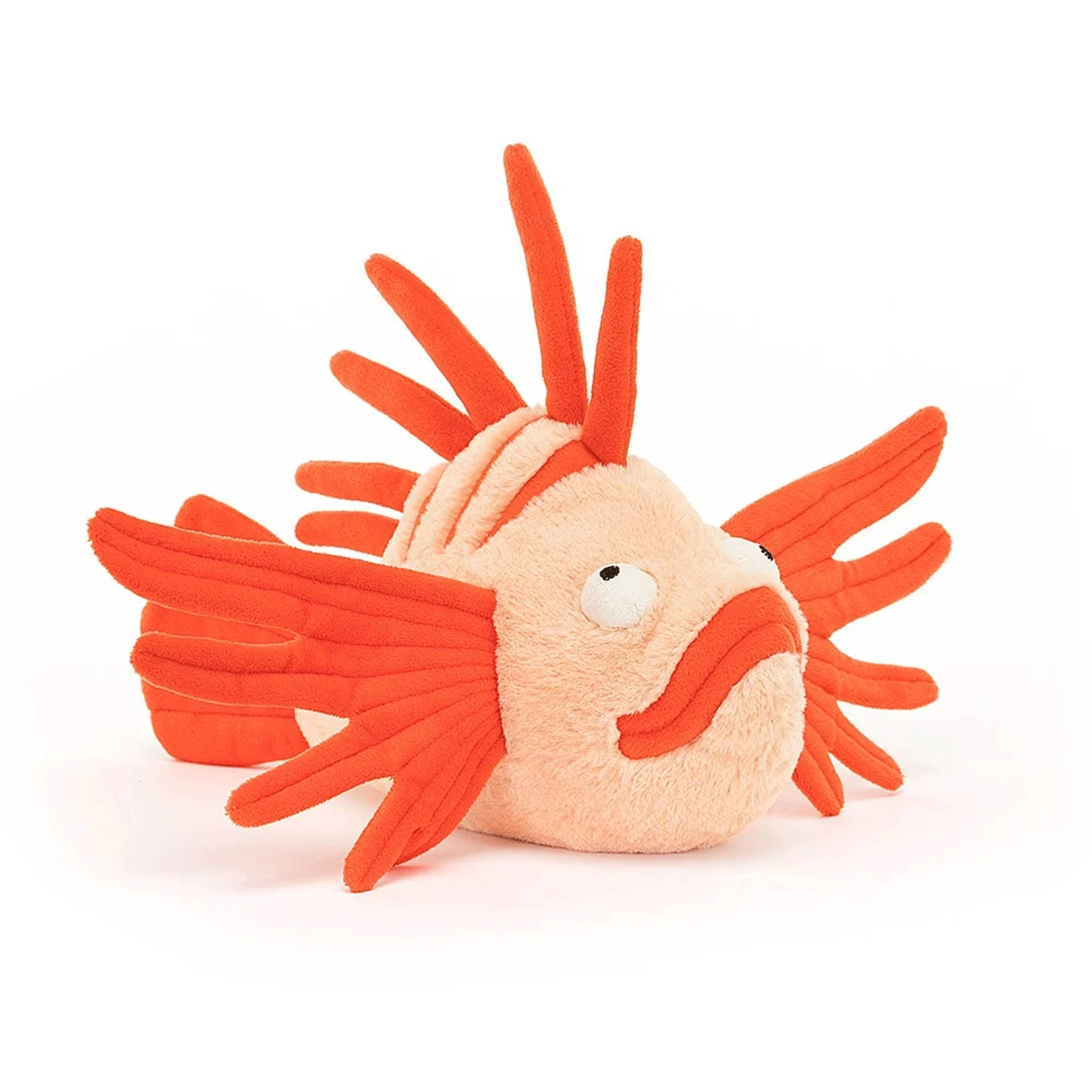 On a white background is orange lionfish shaped stuffed toy. 