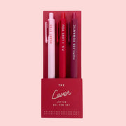 A three pack of pens, one pink, one red and one dark red that read, 'Heart Eyes', 'P.S. I Love You', 'Hopeless Romantic'.