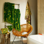 A green floral print towel.