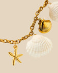 A seashell and gold seashell / starfish bracelet.