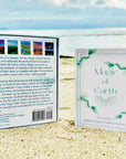 A deck of cards with a box cover of the sky and landscape and text that reads, "55 Card Oracle Deck & Guidebook Magic of Earth".