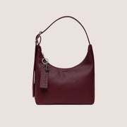 A mahogany recycled leather shoulder bag.