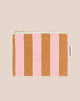 A pink and orange striped coin purse.