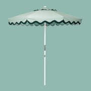 A green and darker green lined umbrella.