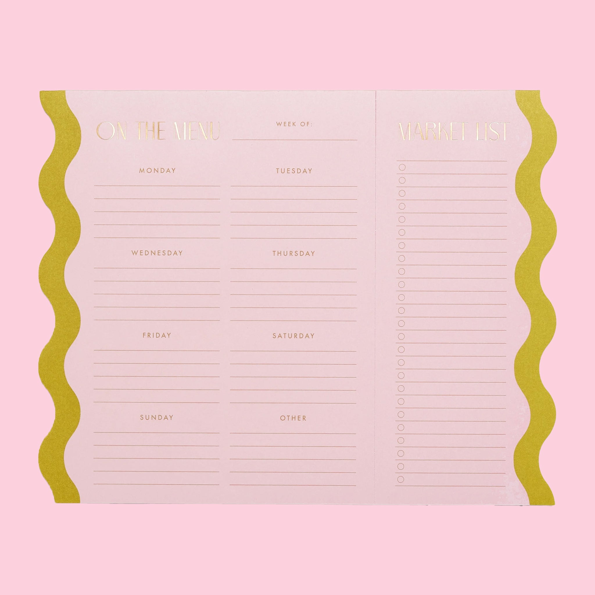 On a pink background is a pink notepad with a chartreuse wavy edge on both sides and a magnet on the back for easy hanging. 