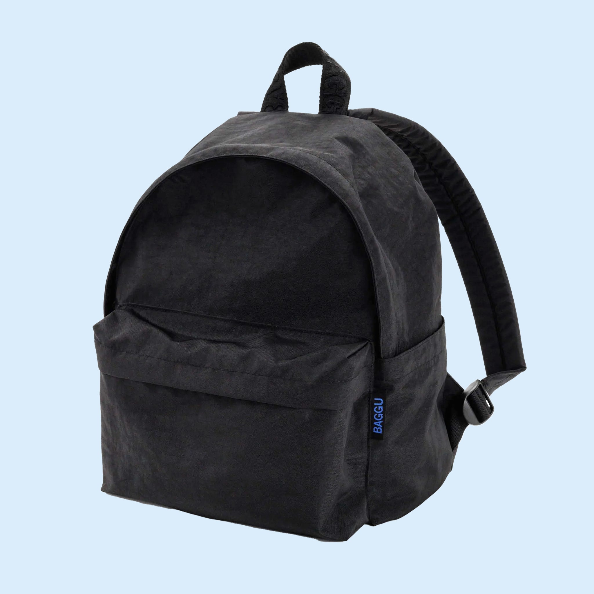 A black nylon backpack with two front zipper compartments and side pockets. 