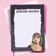 A black notepad with a white middle section and an illustration of Taylor Swift in the corner holding a lighter and text above that reads, 'Midhtnight Musings'.