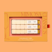 A pack of sugar cube mimosa kits in an orange box.
