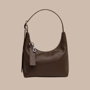 A mini version of the leather shoulder bag in a brown recycled leather.