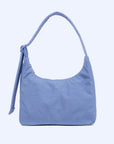 A blue squared off nylon shoulder bag with an adjustable strap.