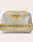 A champagne glitter sparkle mini pouch filled with 21 wedding day essentials for an emergency.