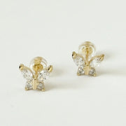 A pair of gold and CZ stone butterfly shaped stud earrings.