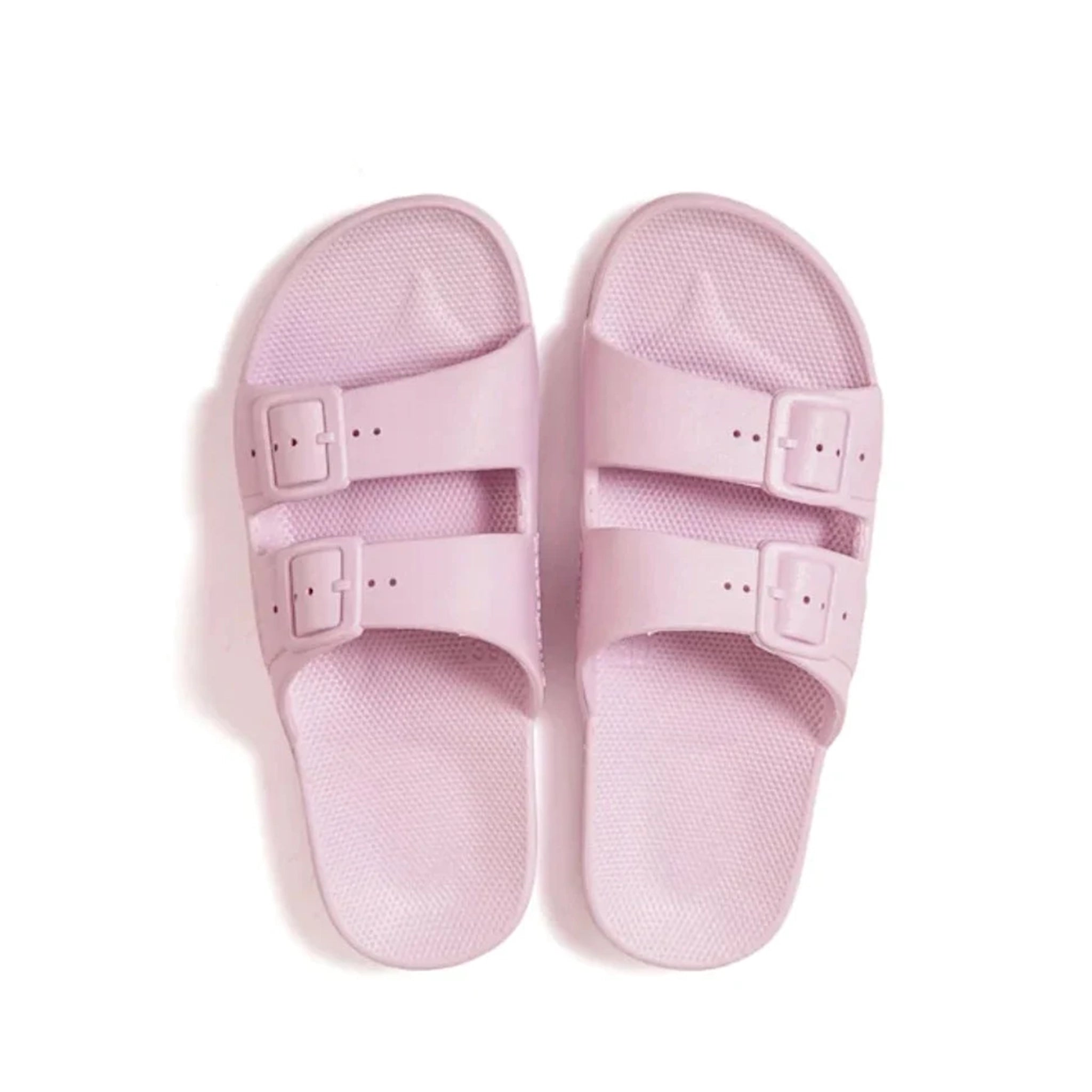 On a white background is a pair of light pink cloud sandals with two straps going across the front. 