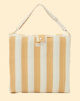 A mustard and ivory striped unfoldable beach or pool chair with folds into a compact square with a strap for carrying.