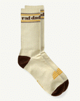 On a white background are a pair of natural colored socks with brown heel and text that reads, "rad dad" along with brown, black and yellow accents.