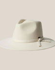 An off white felt hat with a wide brim and a tie detail around the base.