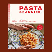 A cookbook with a photo of a plate with past and text that reads, 'Pasta Grannies The Secrets Of Italy's Best Home Cooks'.