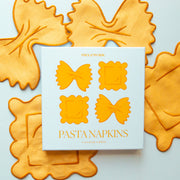 A set of four pasta shaped cloth cocktail napkins.