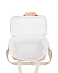 An ivory, floral print picnic bag with white straps and zippers.