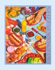 A puzzle with an image of a hot dug and burger spread.
