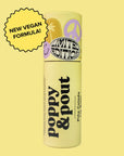 On a yellow background is a yellow cardboard tube of chapstick with black text on the front that reads, "Poppy & Pout", "Piña Colada". The cap has lavender shapes like a smiley face and a peace sign along with a circle with black text inside that reads, "Limited Edition".