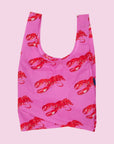 A hot pink nylon tote bag with a red lobster pattern.