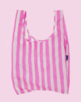 A pink and white striped nylon tote bag.