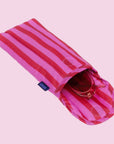 A pink and red striped puffy glasses case.