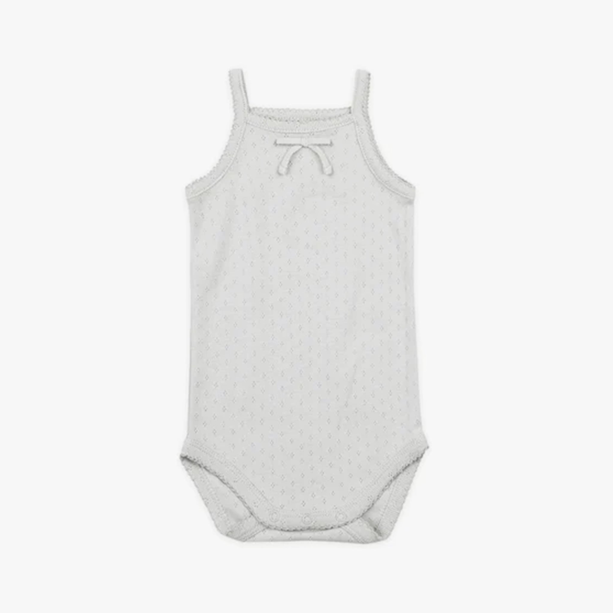 On a white background is a light blue tank onesie with snap closure and a small bow detail at the top. 